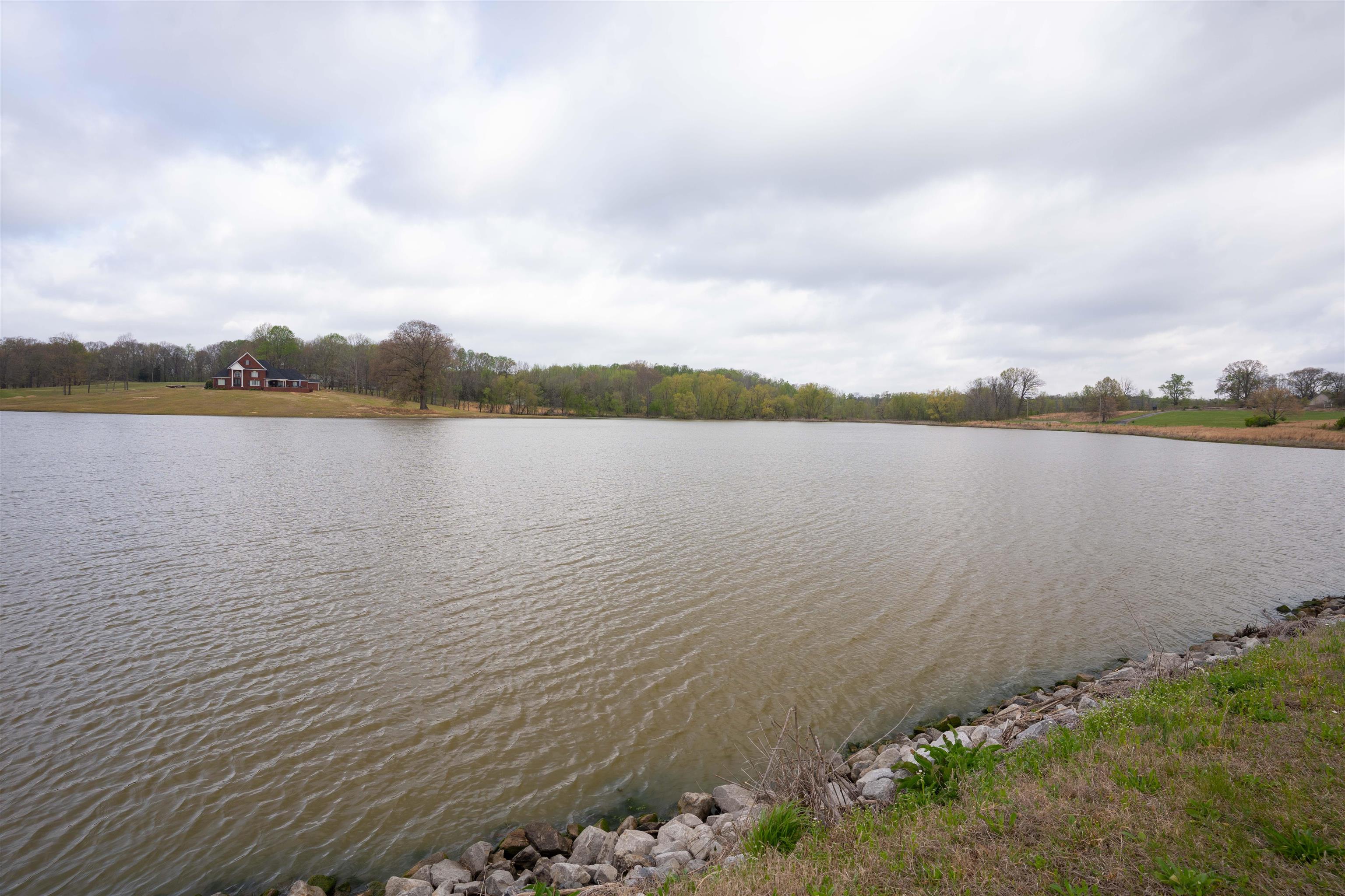 0 Hunters Trace Drive Ripley, TN 38063 - Photo 17 of 33 a view of a lake from a yard
