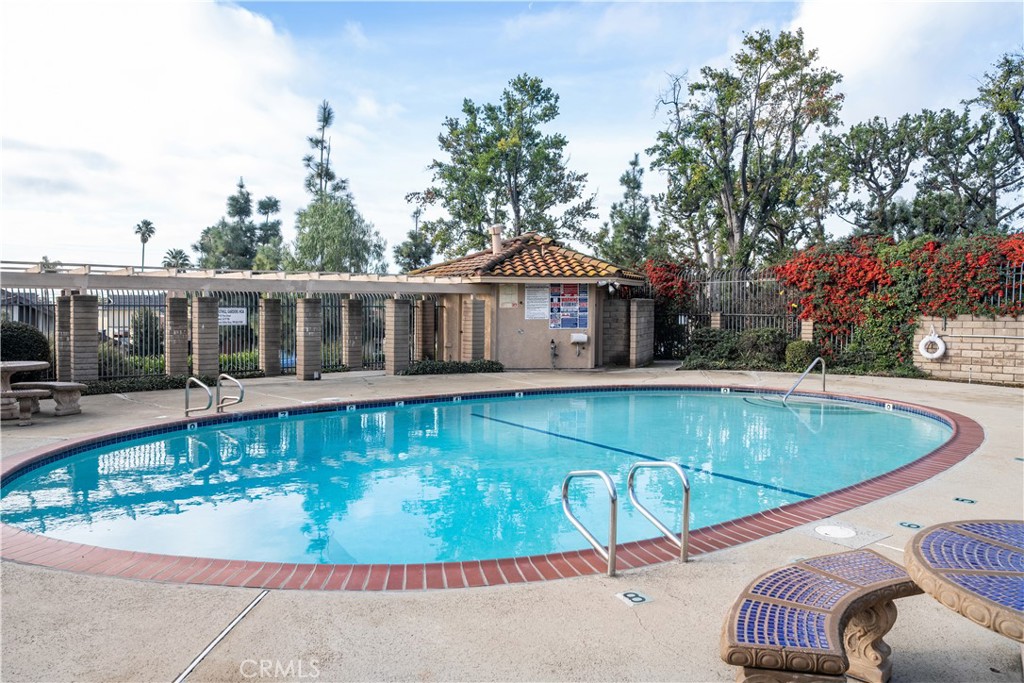 999 West Pine Street, Unit D Upland, CA 91786 - Photo 1 of 16 a view of a swimming pool with a patio
