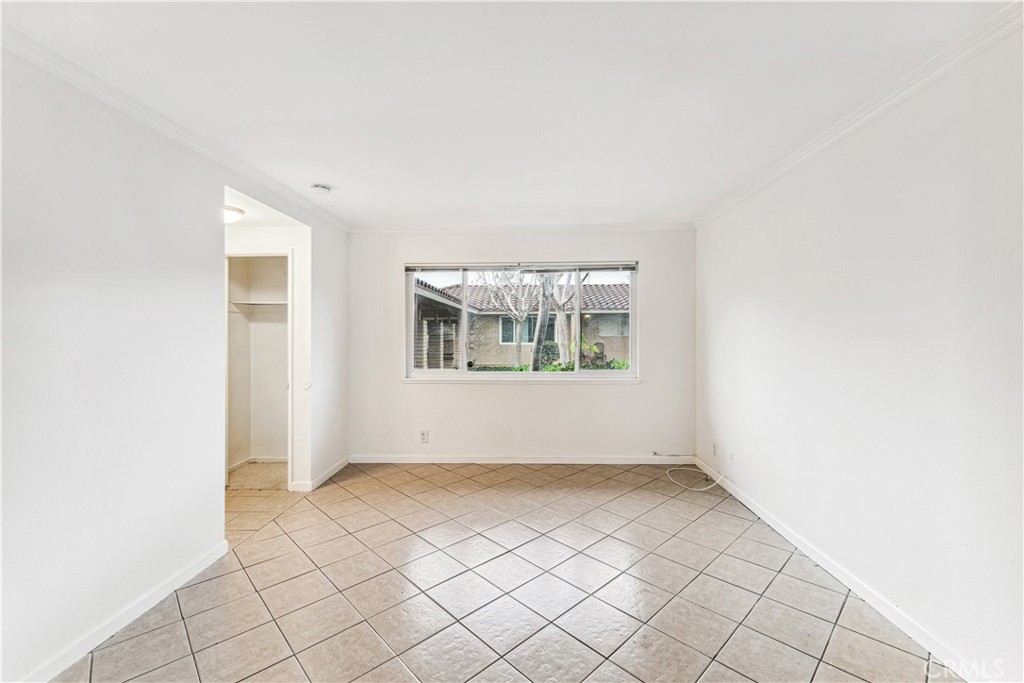 999 West Pine Street, Unit D Upland, CA 91786 - Photo 15 of 16 an empty room with windows