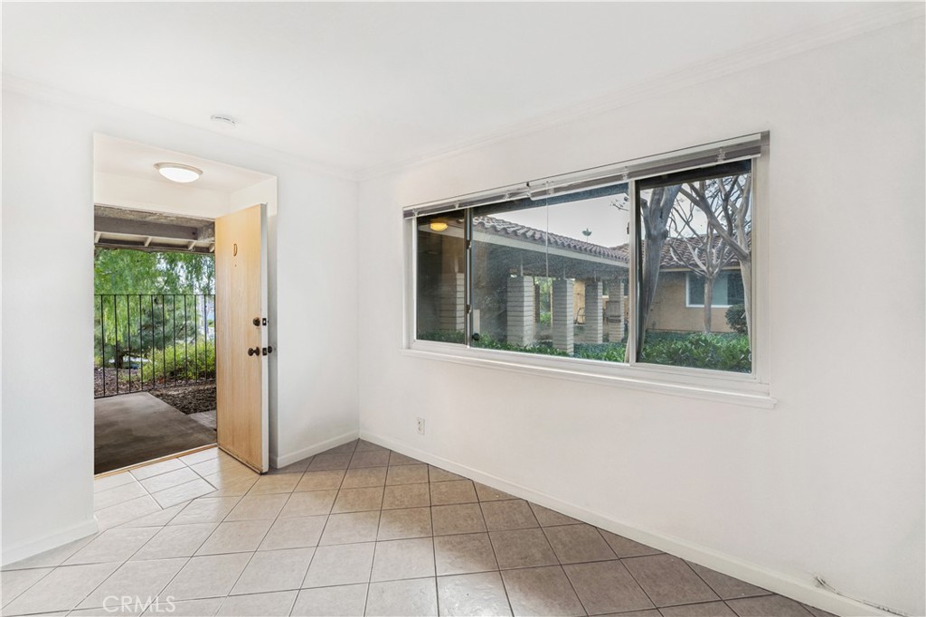 999 West Pine Street, Unit D Upland, CA 91786 - Photo 5 of 16 a view of an entryway with a glass door