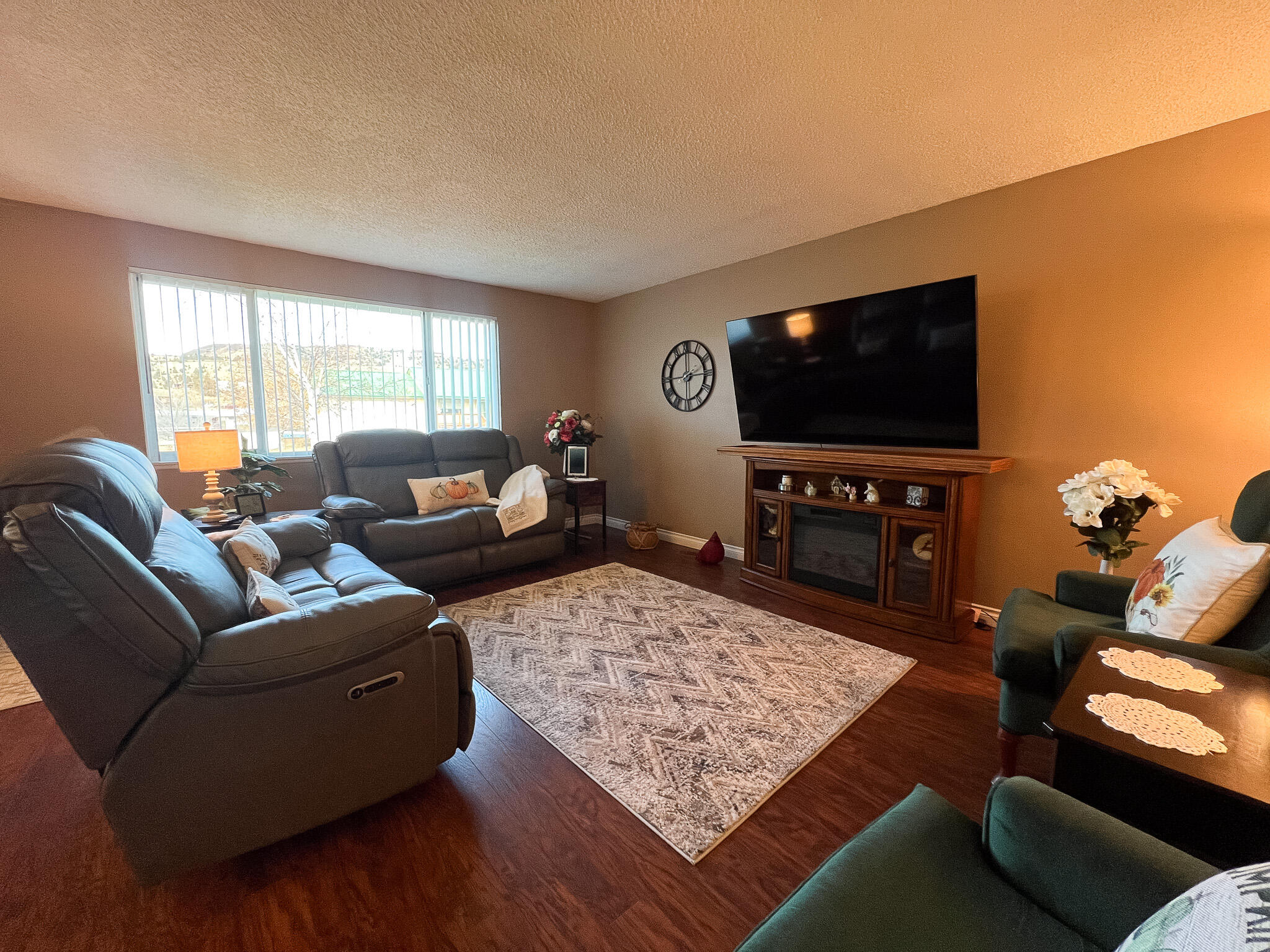 1225 East B Street Fossil, OR 97830 - Photo 3 of 33 a living room with furniture and a flat screen tv