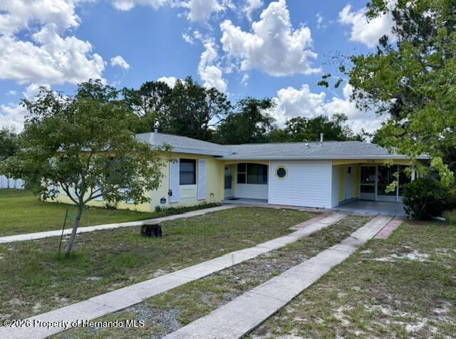 6848 Treehaven Drive Spring Hill, FL 34606 - Photo 2 of 34 Pavered driveway