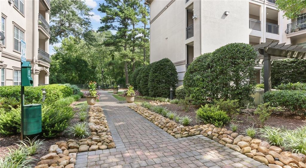 2910 Clairmont Road, Unit PLAN 1 Atlanta, GA 30329 - Photo 17 of 29 a view of a back yard of the house