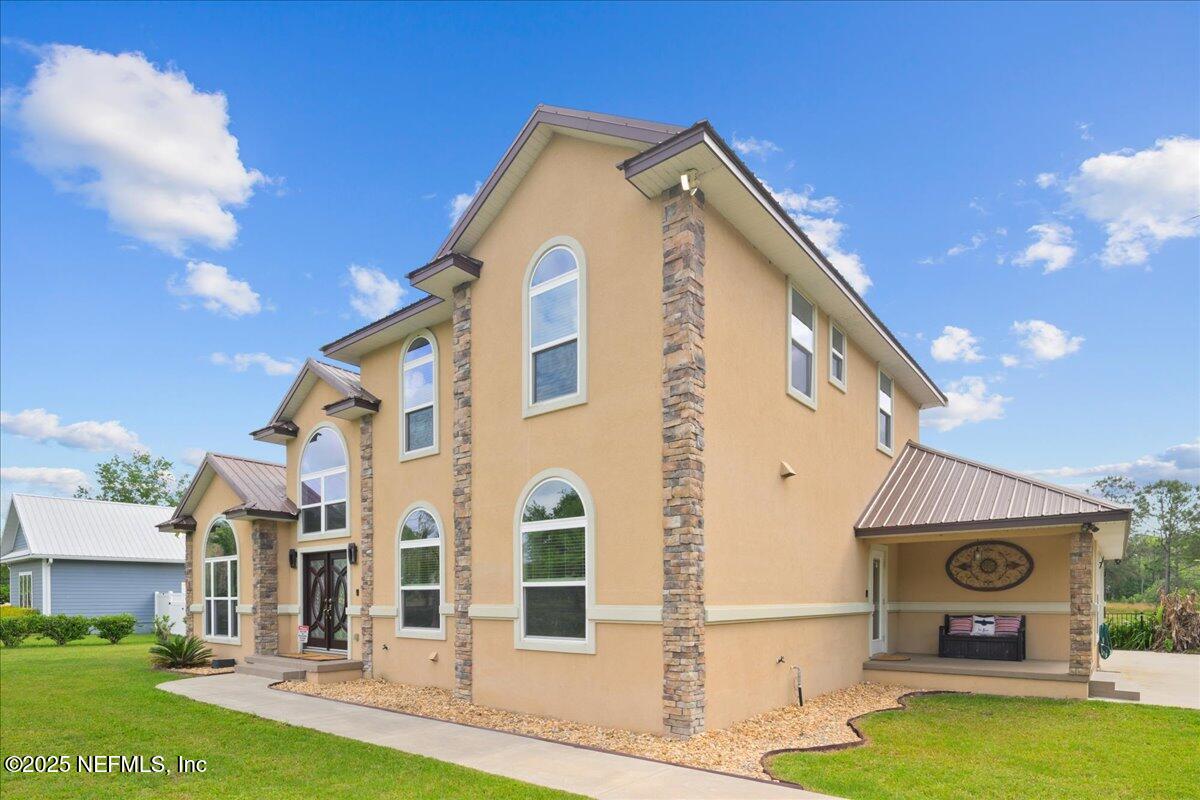 9835 Southwest 80th Place Hampton, FL 32044 - Photo 5 of 75 05-JWLeeMedia2504107114