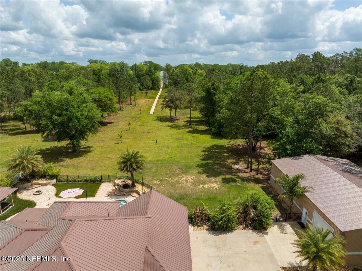 9835 Southwest 80th Place Hampton, FL 32044 - Photo 65 of 75 65-JWLeeMediaAerial2504103226-HDR