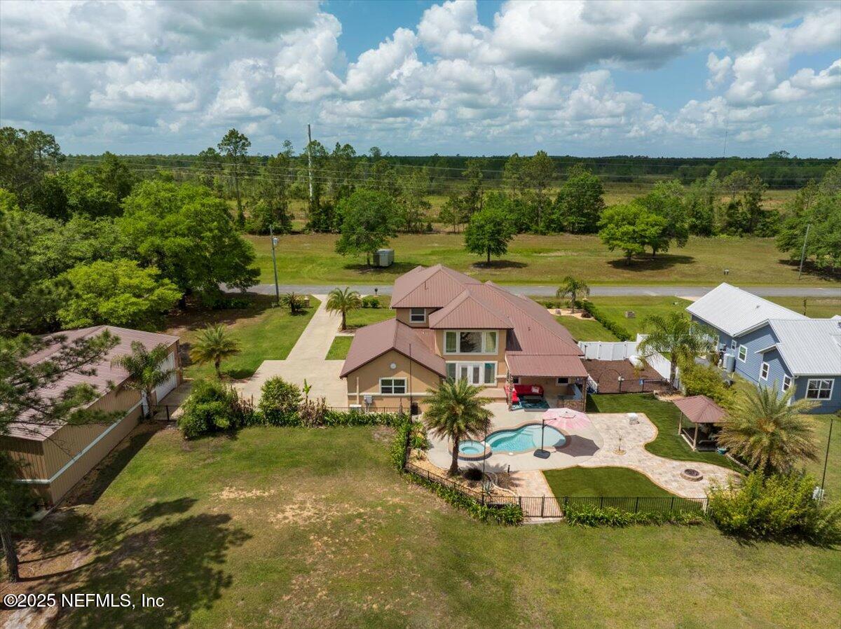 9835 Southwest 80th Place Hampton, FL 32044 - Photo 66 of 75 66-JWLeeMediaAerial2504103229-HDR
