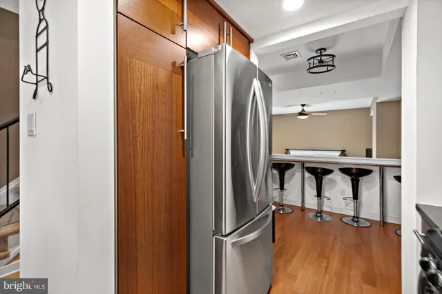 a bathroom with a mirror and a shower