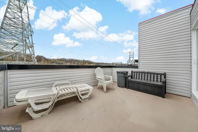 a view of a terrace with sitting area