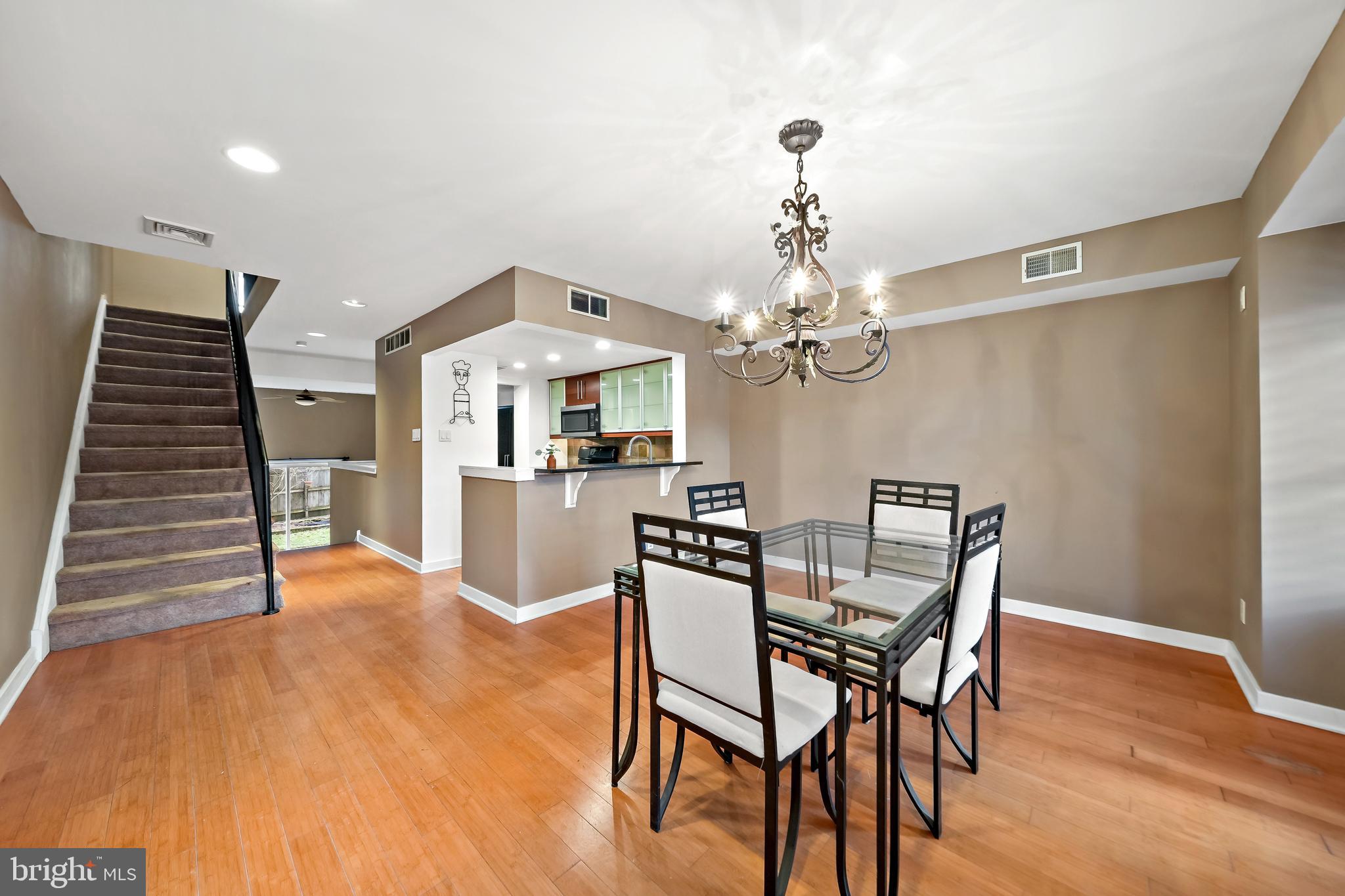 4041 Cresson Street Philadelphia, PA 19127 - Photo 7 of 32 a view of a dining room with furniture and wooden floor