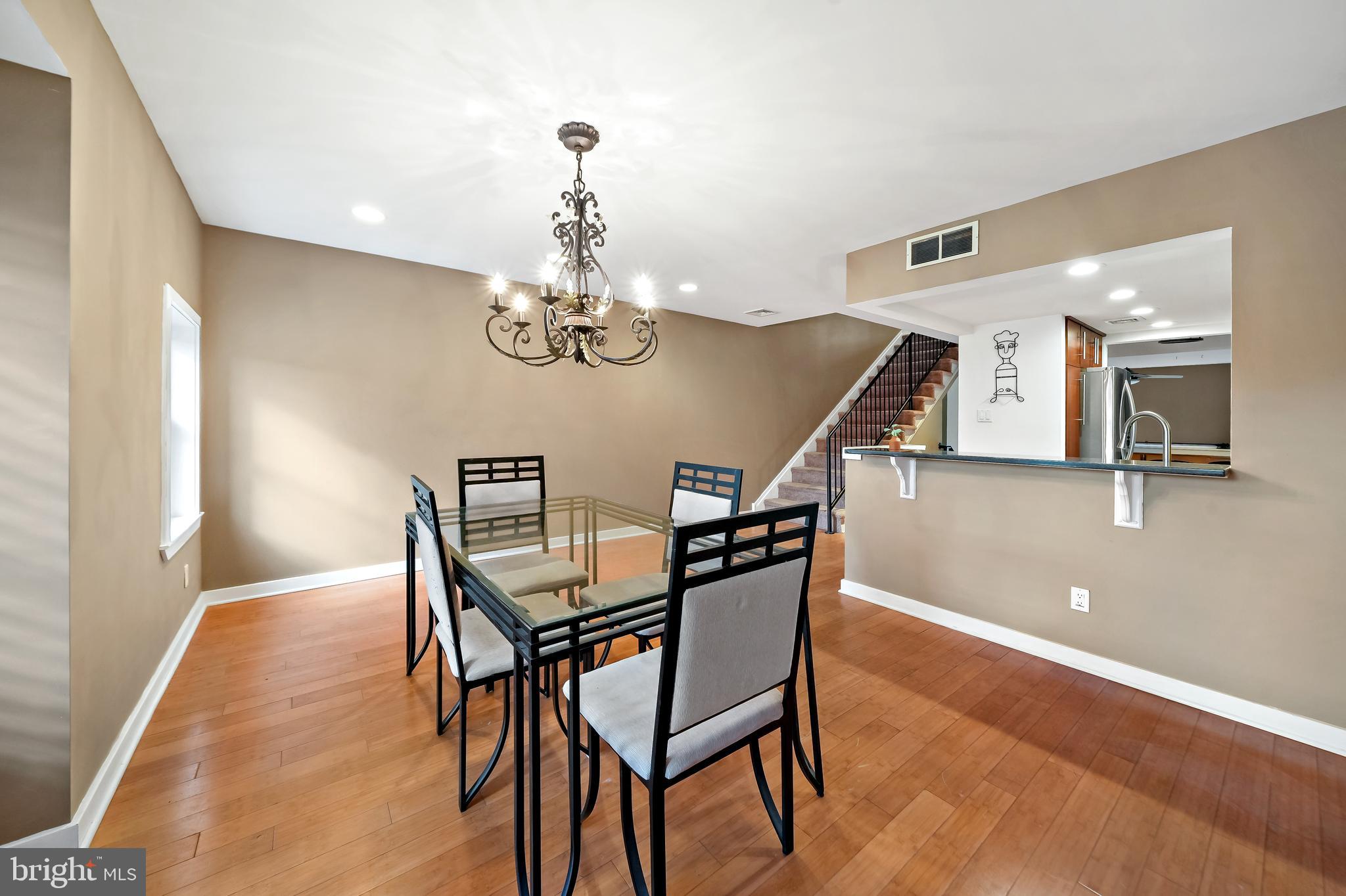 4041 Cresson Street Philadelphia, PA 19127 - Photo 8 of 32 a view of a dining room with furniture and chandelier