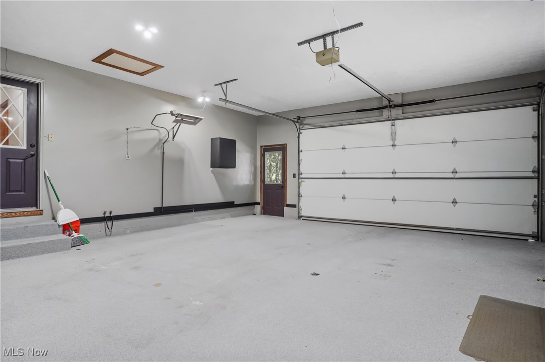 370 Wilcox Road Youngstown, OH 44515 - Photo 40 of 49 Garage featuring a garage door opener