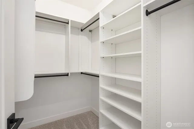 a view of an empty walk in closet