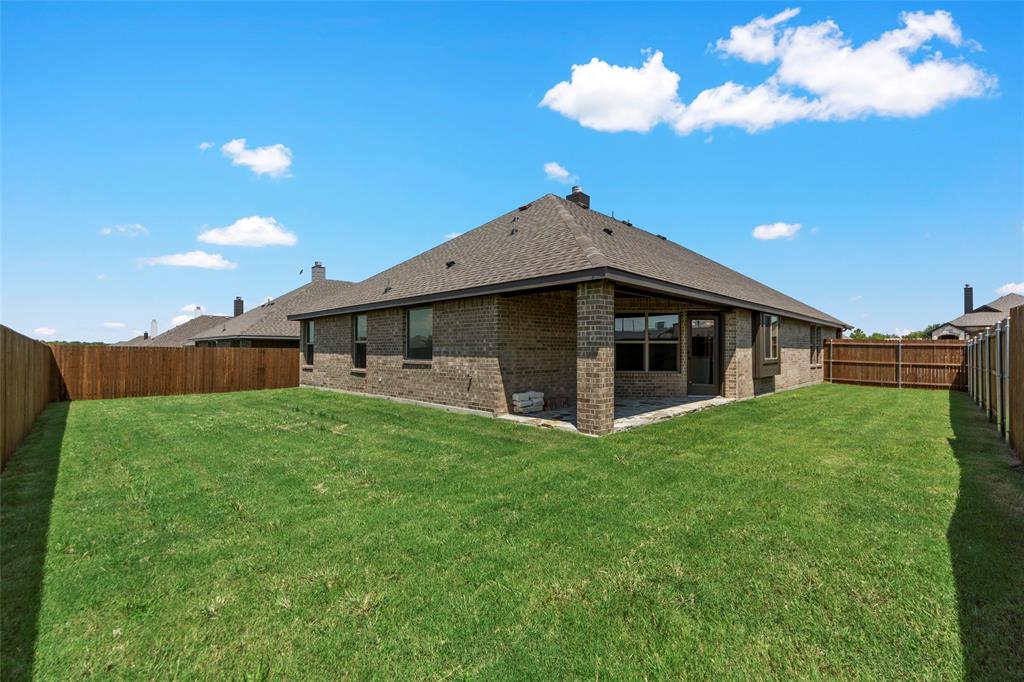 314 Pennington Road Josephine, TX 75173 - Photo 24 of 26 a front view of a house with a garden