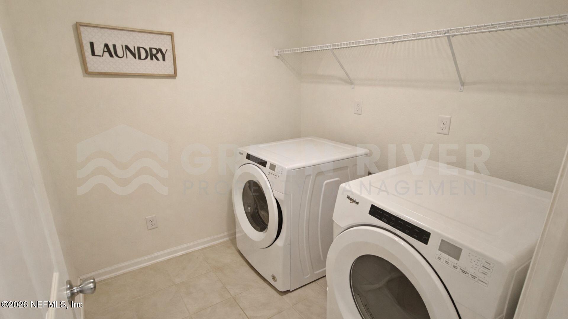 352 Rambling Brk Trail St. Johns, FL 32259 - Photo 31 of 35 a utility room with dryer and washer