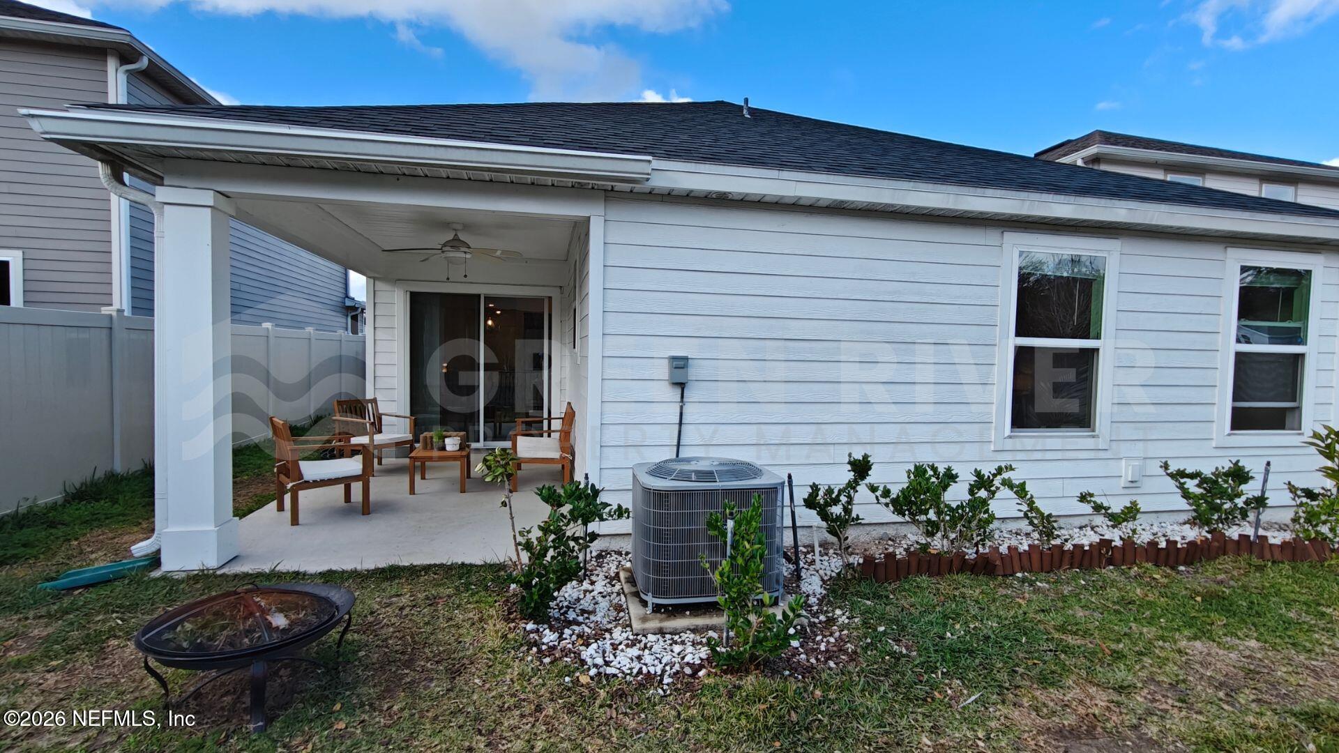 352 Rambling Brk Trail St. Johns, FL 32259 - Photo 34 of 35 a front view of a house with a garden