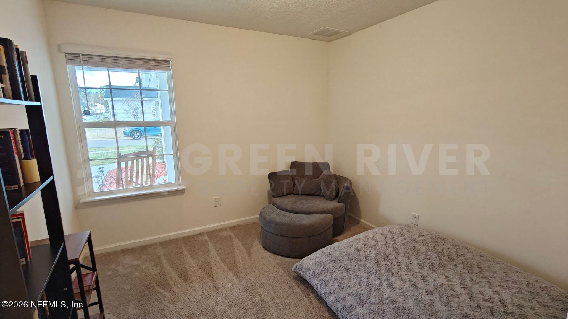 352 Rambling Brk Trail St. Johns, FL 32259 - Photo 8 of 35 a bedroom with a bed and a window