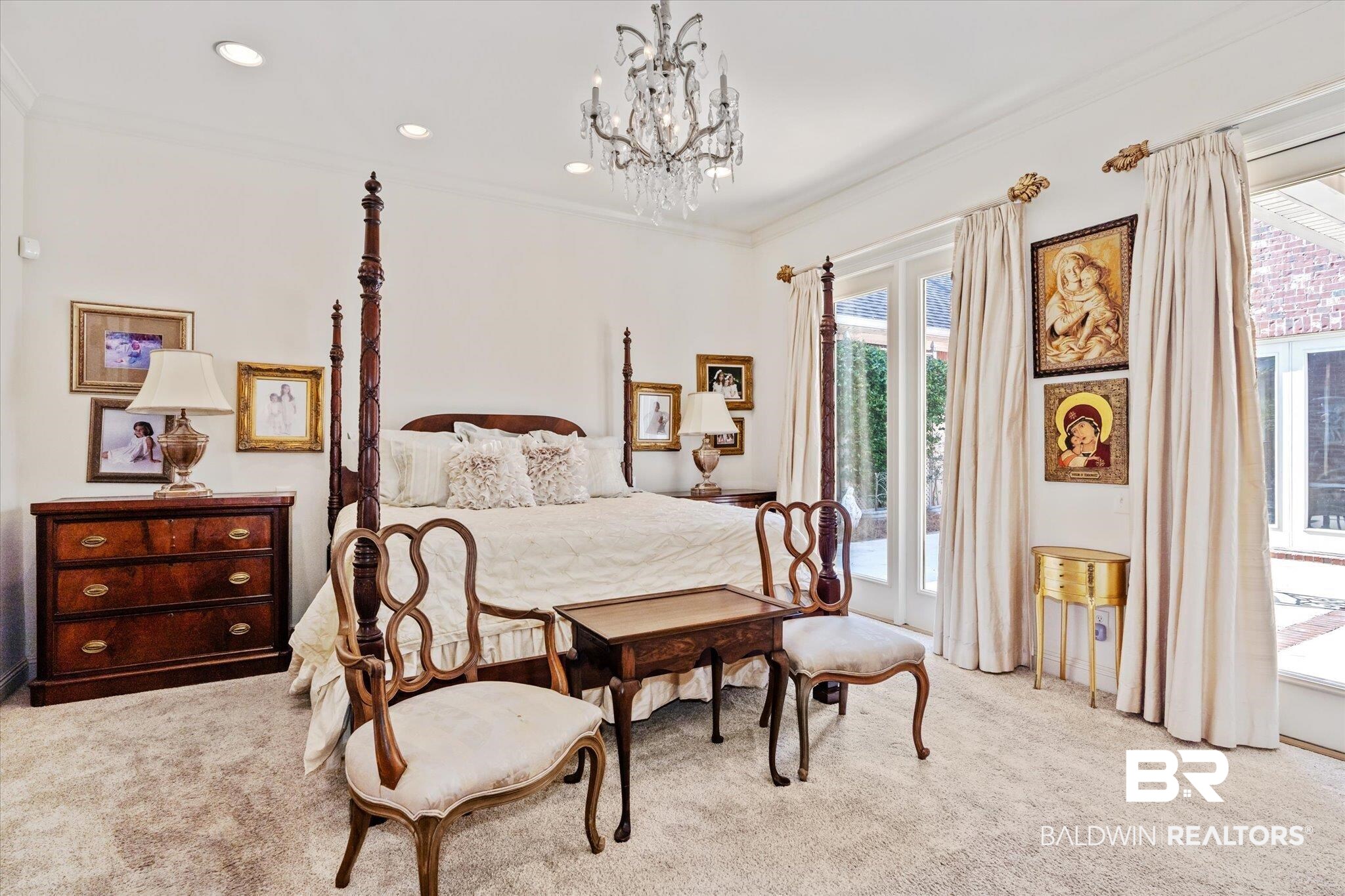 3963 Wimbledon Park Mobile, AL 36608 - Photo 24 of 51 Bedroom with multiple windows, ornamental molding, and light carpet