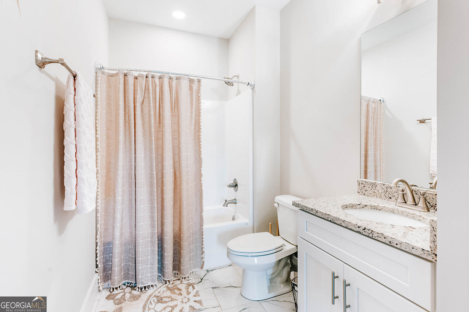 1150 Chivers Road Buckhead, GA 30625 - Photo 6 of 29 a bathroom with a granite countertop sink toilet and shower
