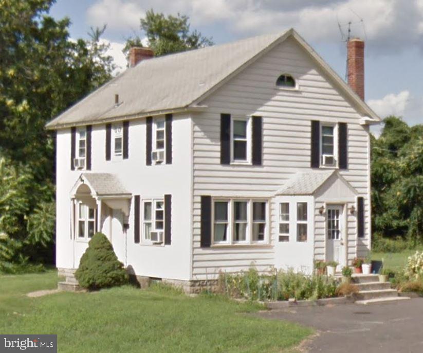 80 Highway 73 Berlin, NJ 08009 - Photo 2 of 6 a front view of a house with a yard