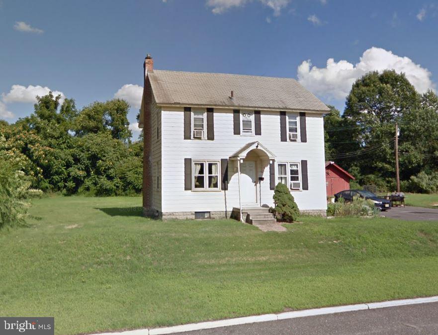 80 Highway 73 Berlin, NJ 08009 - Photo 3 of 6 a front view of a house with a yard
