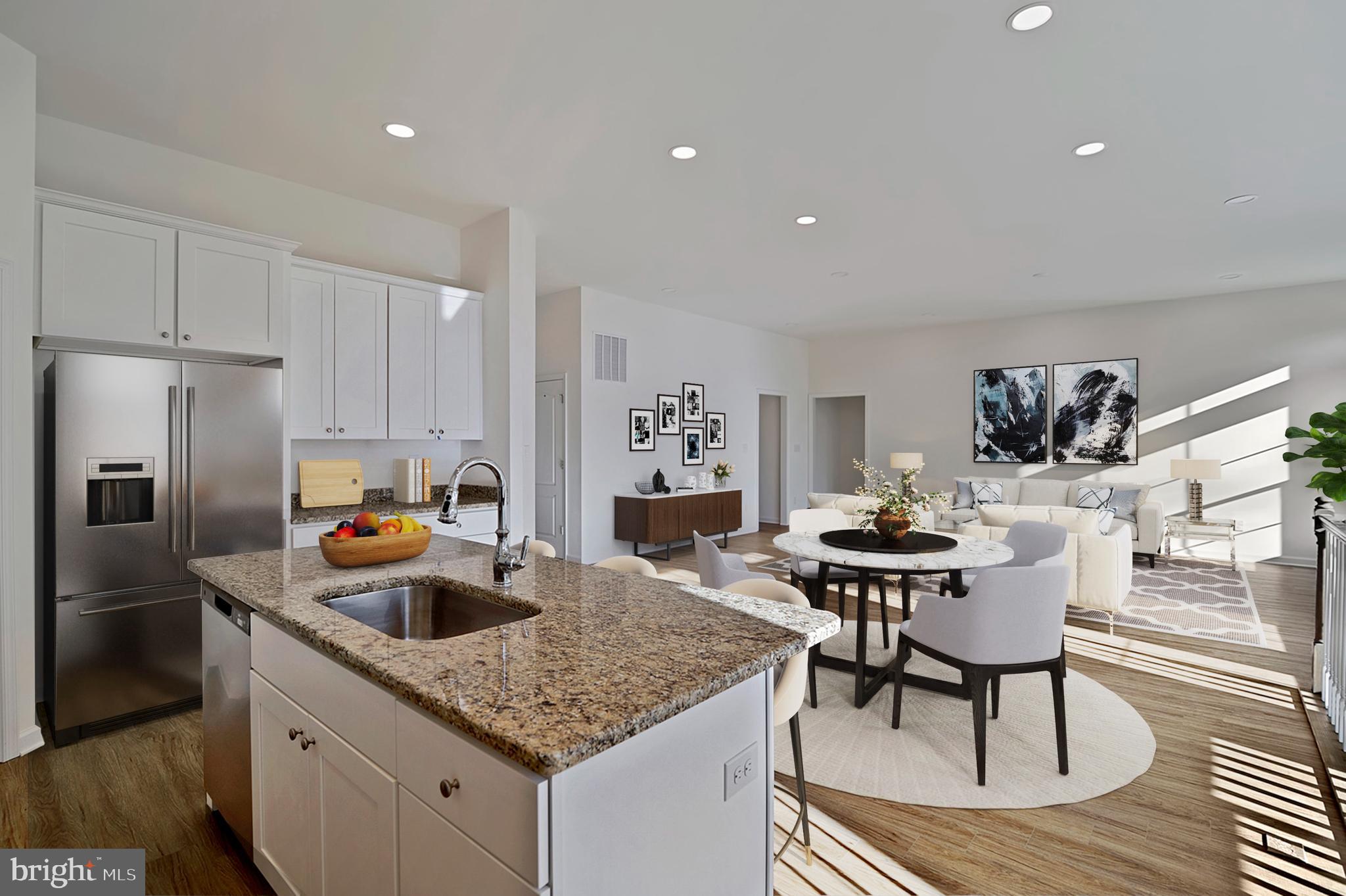 25 Belfry Drive, Unit LEWS Felton, DE 19943 - Photo 10 of 12 a kitchen with a table chairs and refrigerator
