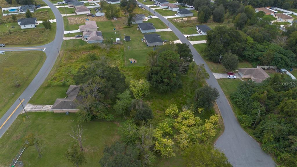 Laurel Court Ocala, FL 34480 - Photo 5 of 9 an aerial view of residential houses with outdoor space and trees