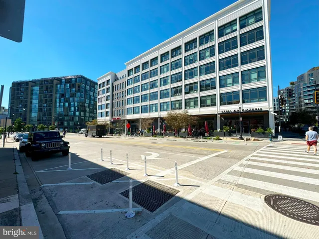 a front view of a building with glass windows