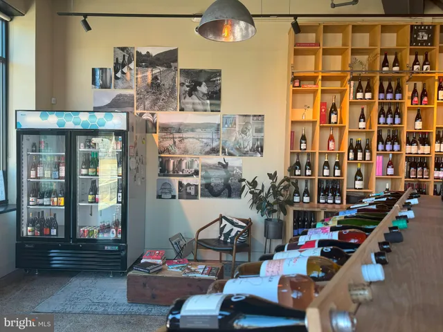 a view of a chairs and table in the balcony