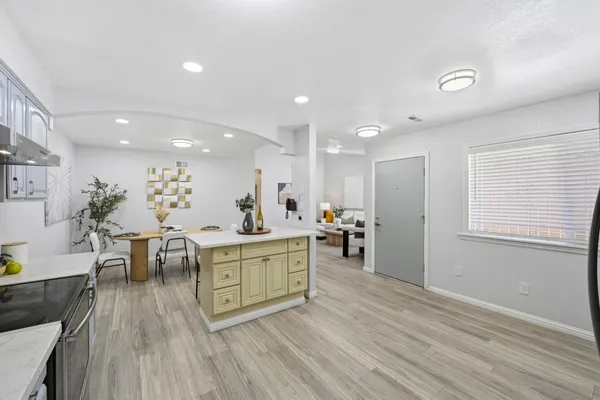 a view of a kitchen and dining room