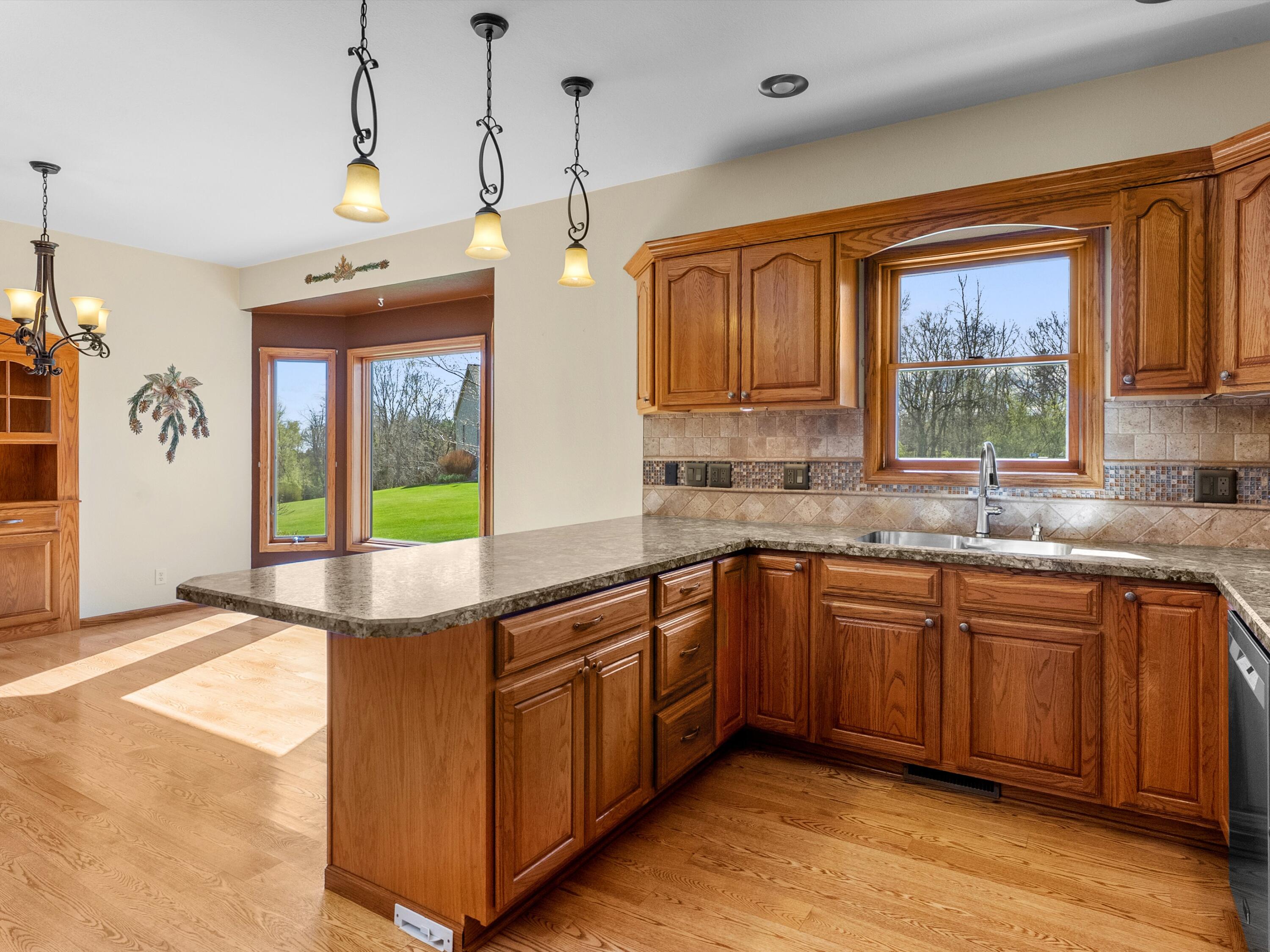 4818 Maplecrest Ridge Road Franklin, WI 54247 - Photo 14 of 62 Open Concept Kitchen and Dining