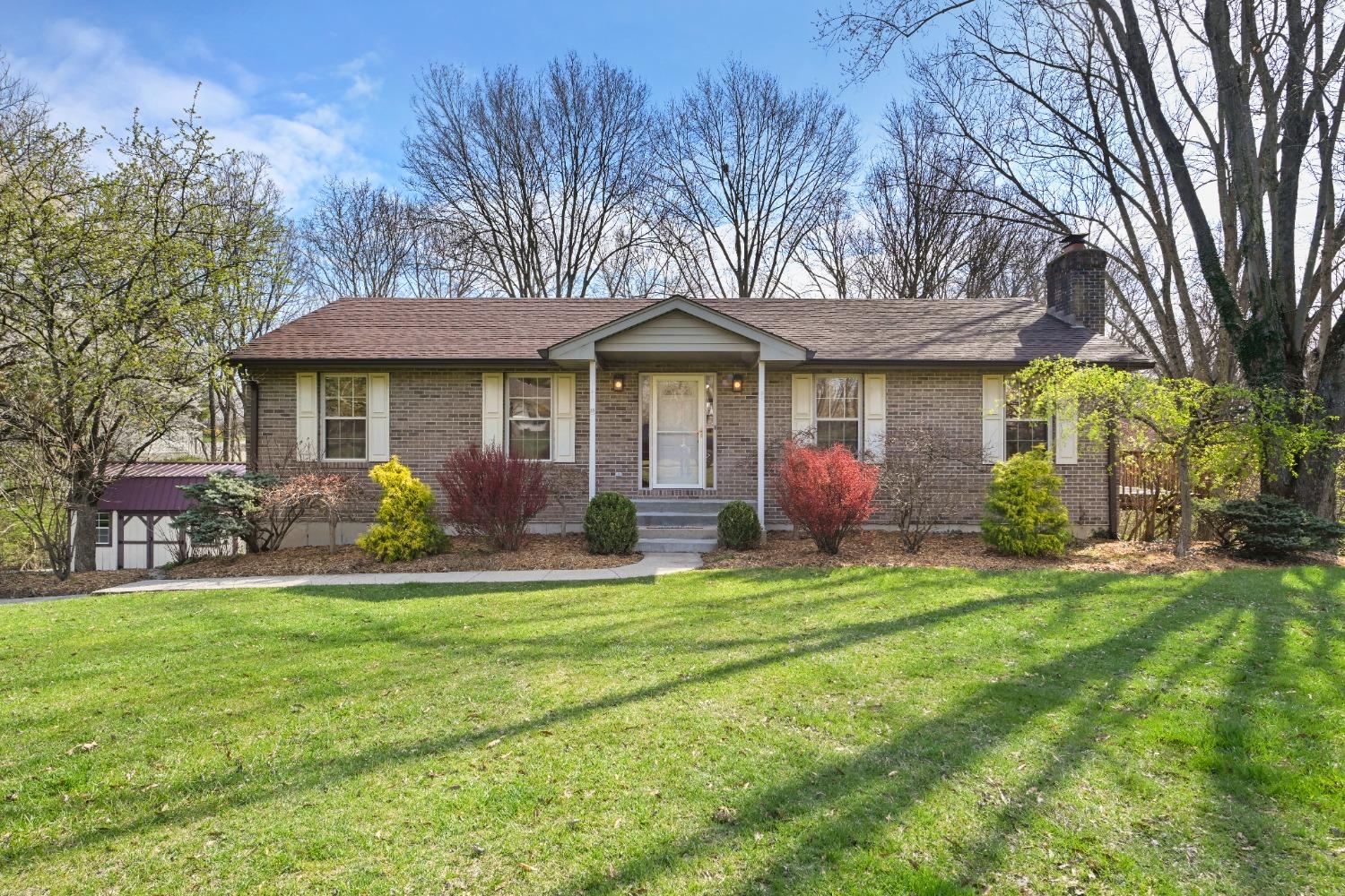 Attractive brick ranch on large private lot!