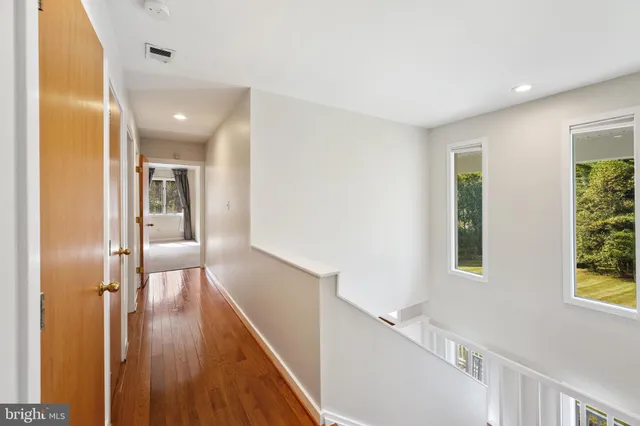 a view of closet area with empty racks