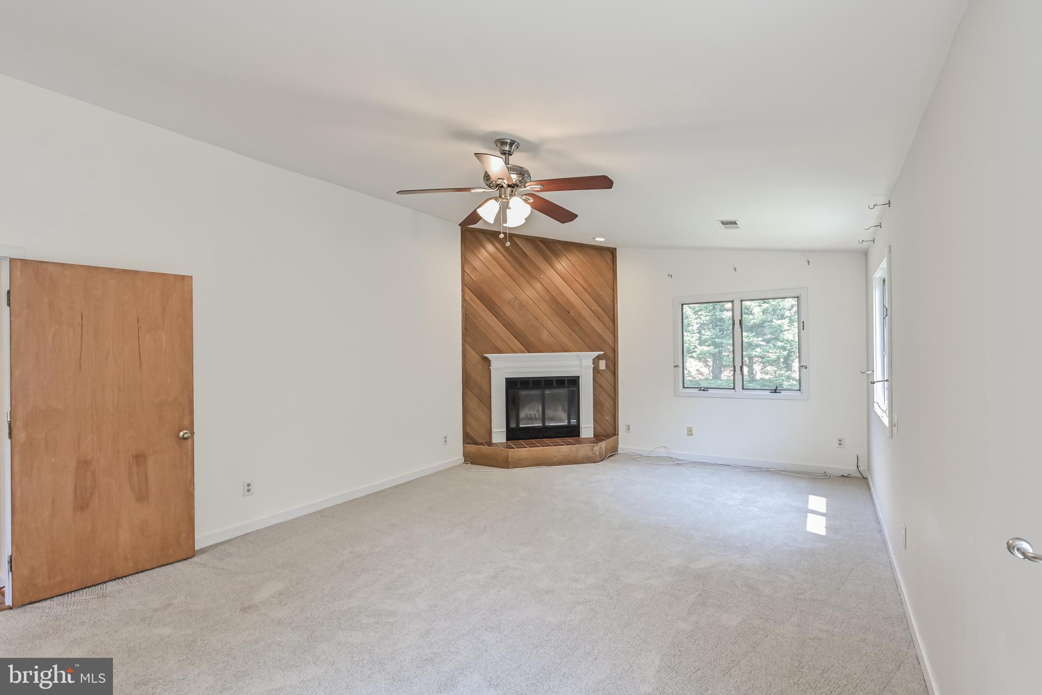 445 Springvale Road Great Falls, VA 22066 - Photo 25 of 62 Fireplace in Primary Bedroom