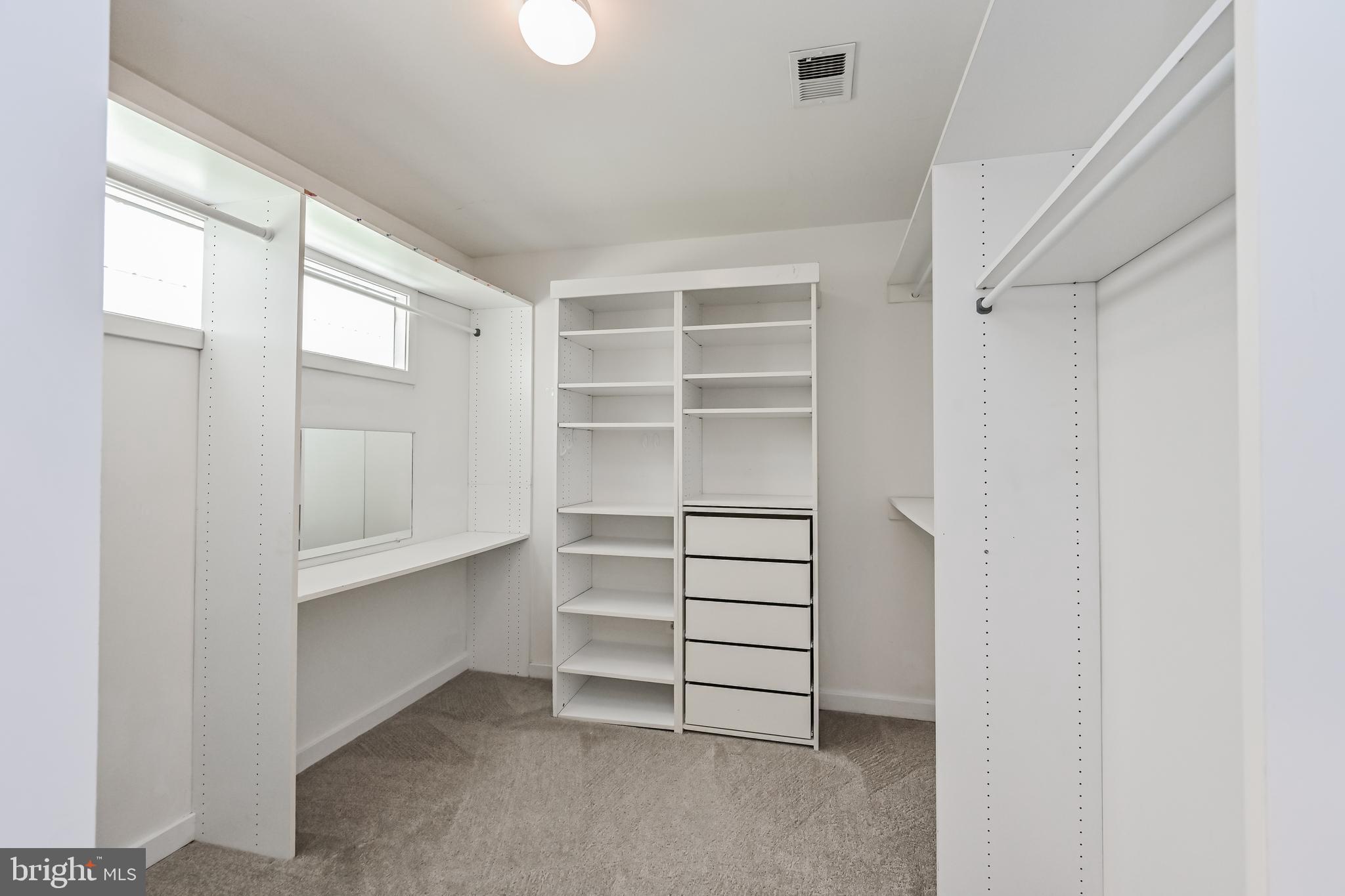 445 Springvale Road Great Falls, VA 22066 - Photo 27 of 62 a view of closet area with empty racks