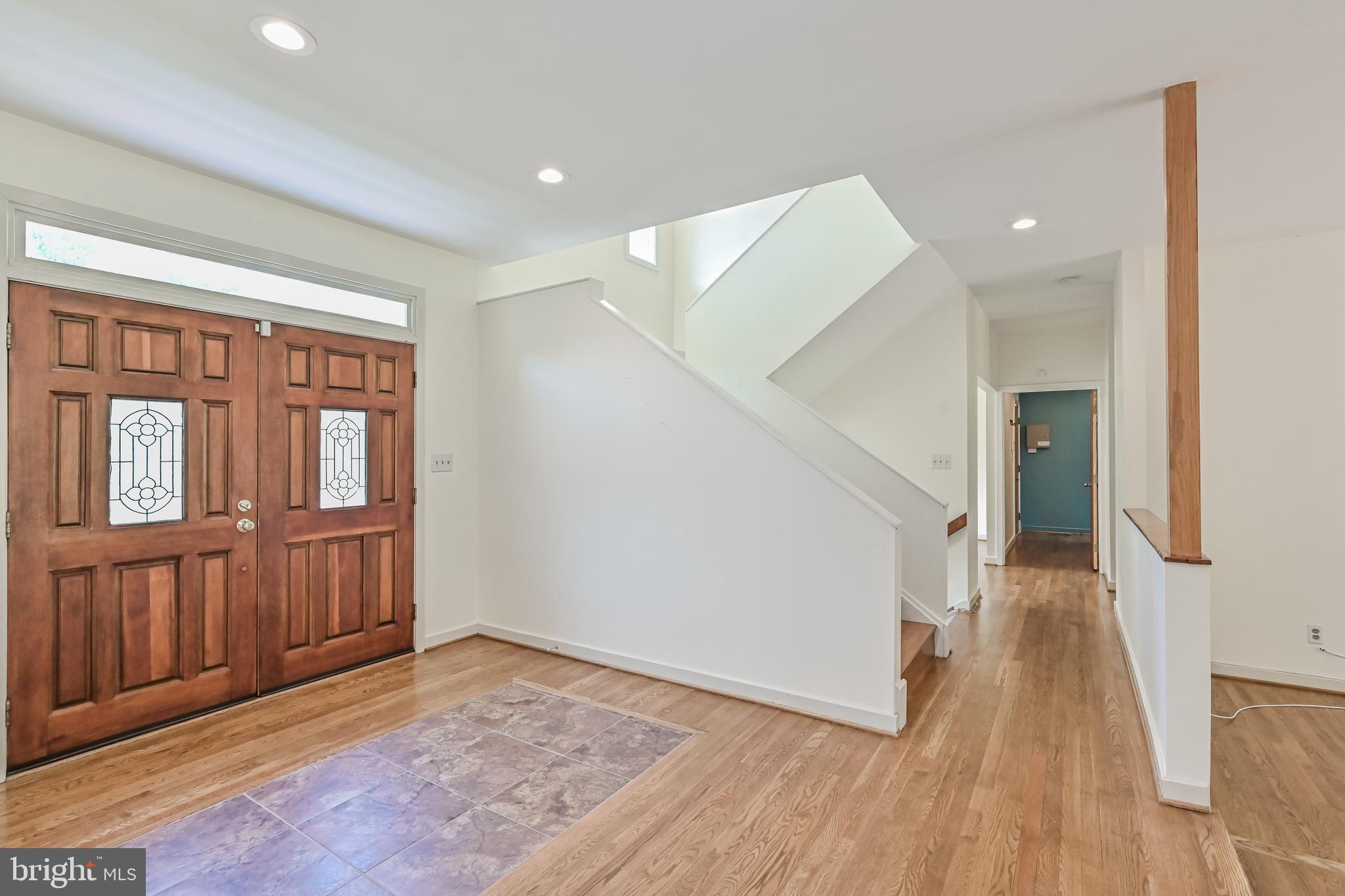 445 Springvale Road Great Falls, VA 22066 - Photo 4 of 62 wooden floor in an empty room with a window