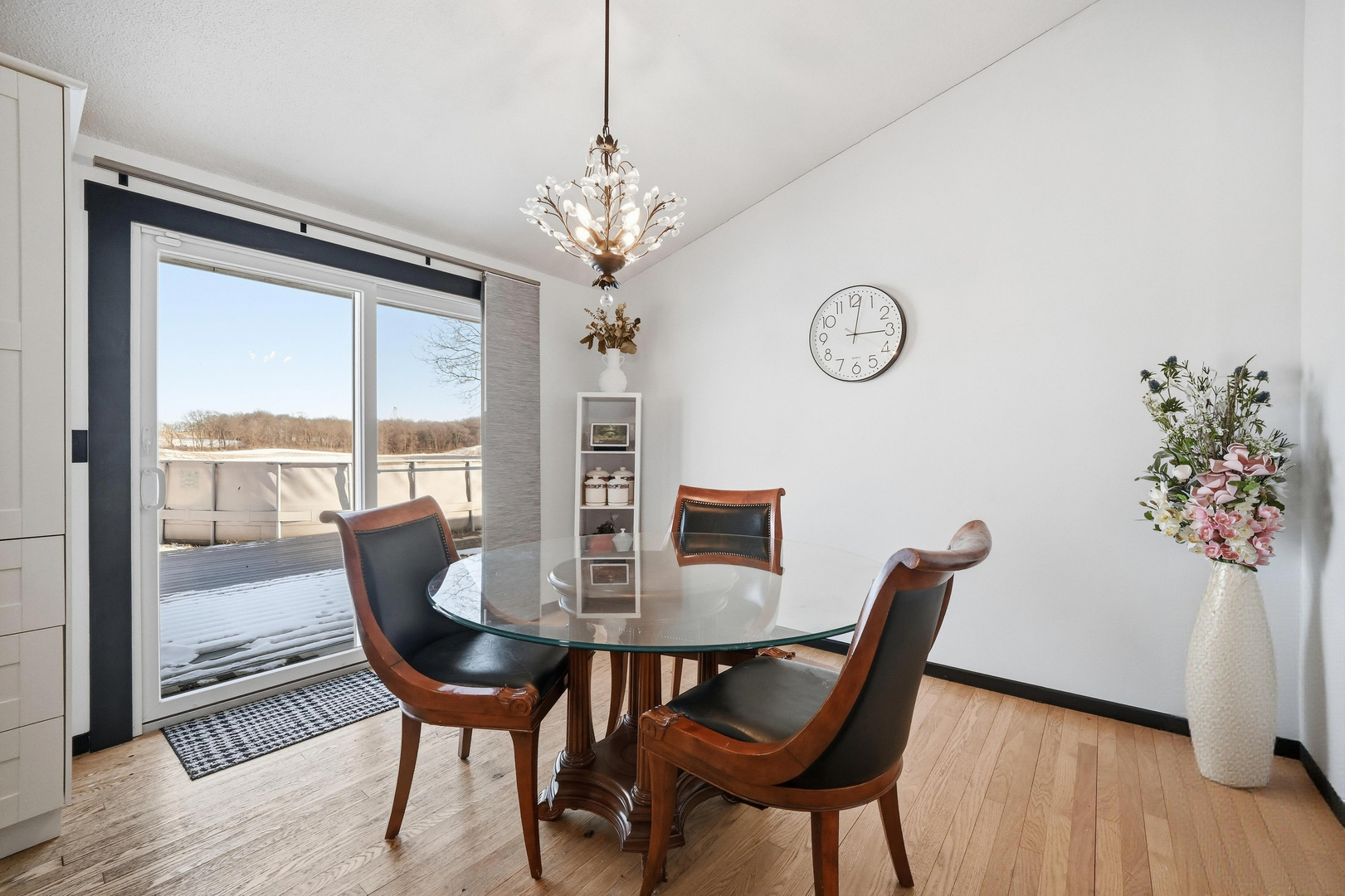 9807 North Leaf River Road Leaf River, IL 61047 - Photo 14 of 38 a view of a dining room with furniture window and wooden floor