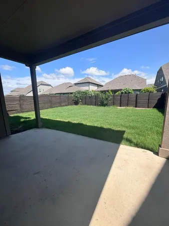 a view of outdoor space and yard