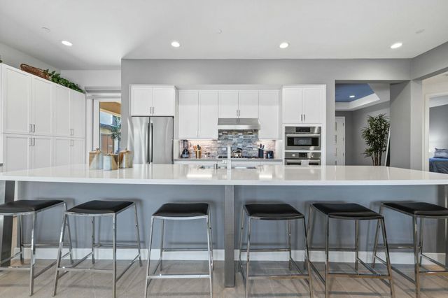 a bedroom with a bed and furniture