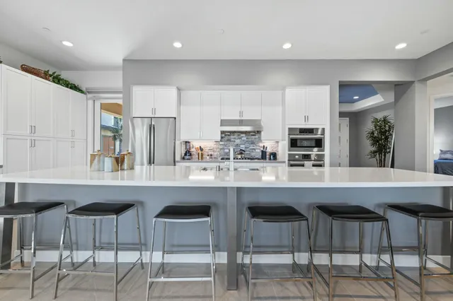 a bedroom with a bed and furniture