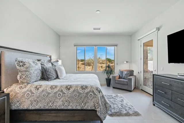 a bathroom with a shower sink and mirror