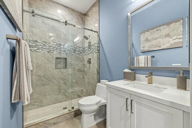 a view of a livingroom with furniture and a fireplace