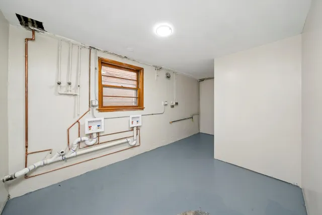 a bathroom with 2 sink and a bathtub