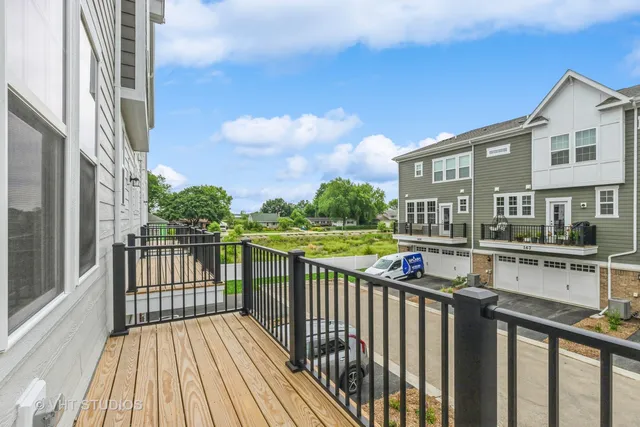 a view of a street with wooden stairs
