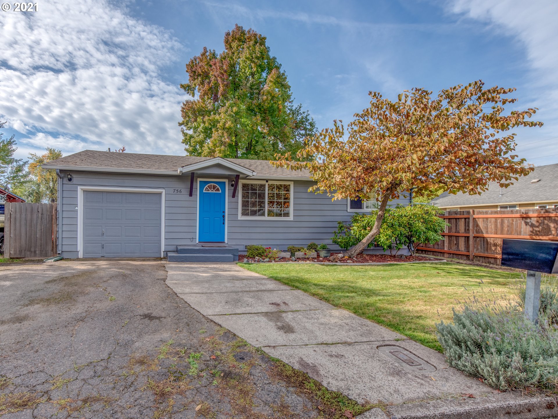 756 North 23rd Street Springfield, OR 97477 - Photo 1 of 22 a front view of a house with a yard and garage