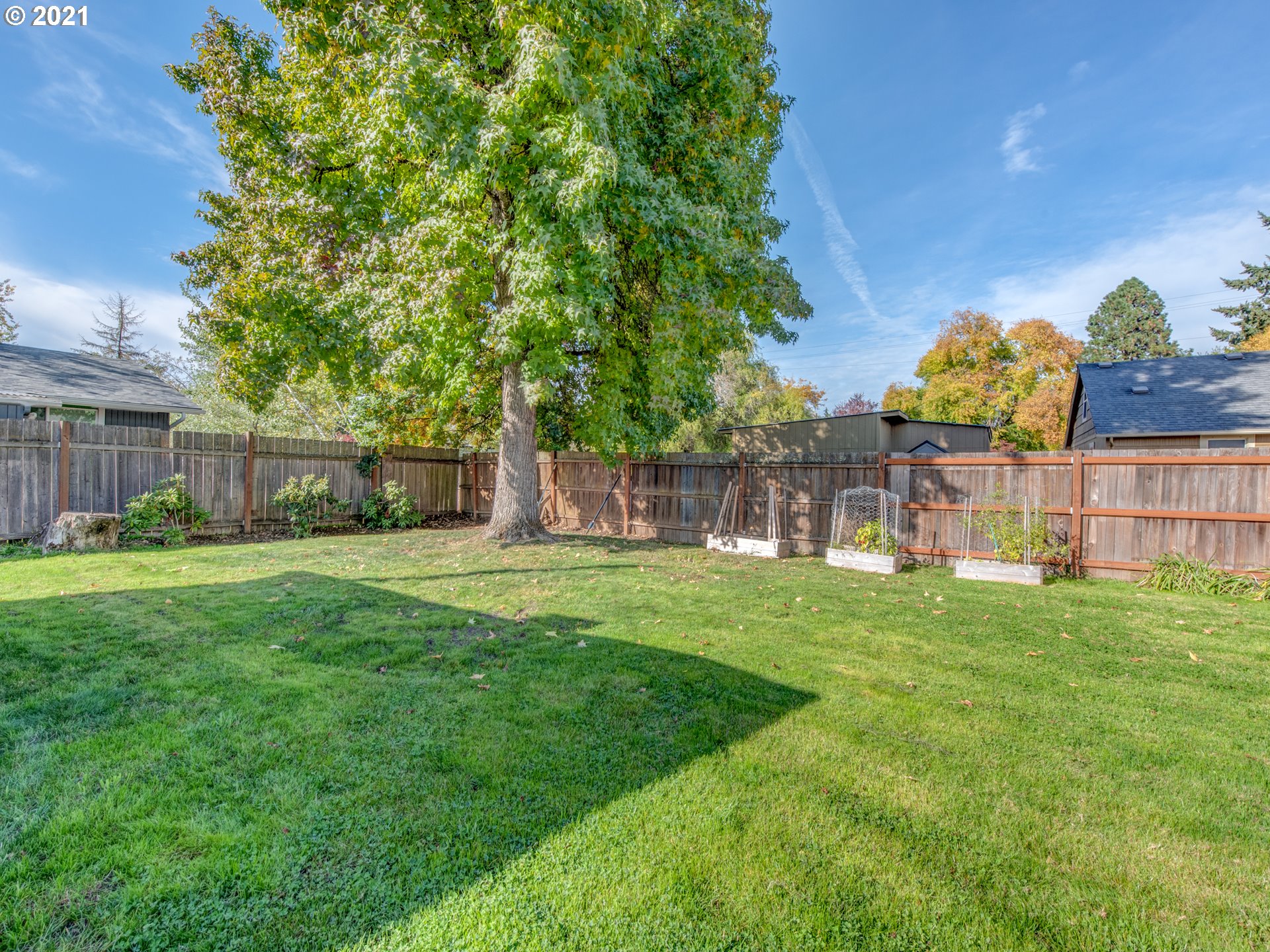 756 North 23rd Street Springfield, OR 97477 - Photo 16 of 22 a view of a house with backyard and a sitting area