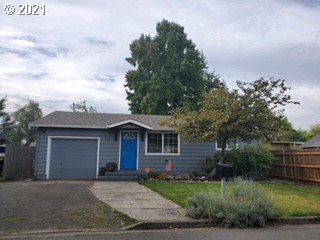 756 North 23rd Street Springfield, OR 97477 - Photo 3 of 22 a front view of a house with garden