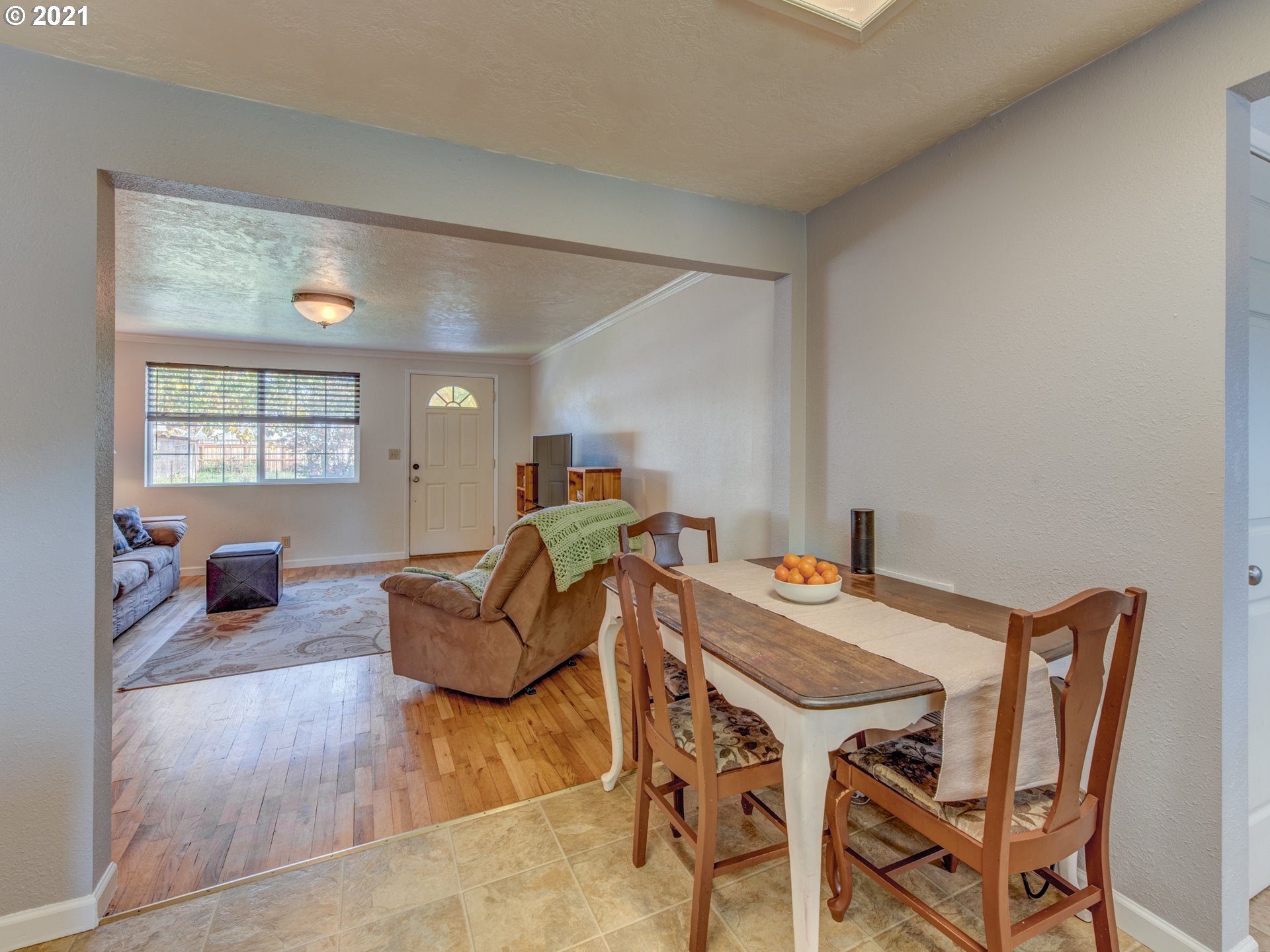 756 North 23rd Street Springfield, OR 97477 - Photo 7 of 22 a living room with furniture and wooden floor