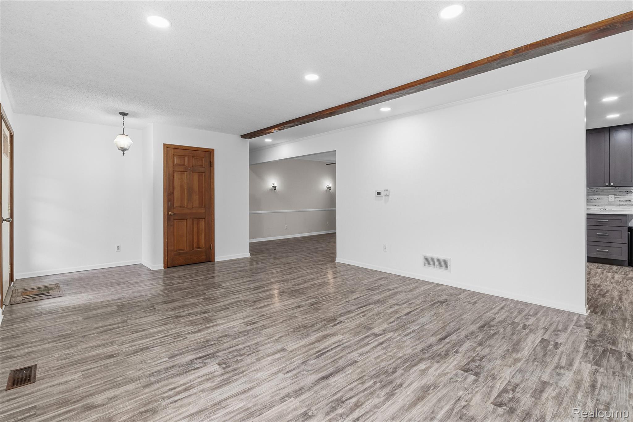 3432 South State Road Davison, MI 48423 - Photo 11 of 58 Unfurnished living room featuring light wood-style floors and recessed lighting