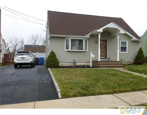 161 East Hill Road Colonia, NJ 07067 - Photo 1 of 16 a house view with a garden space