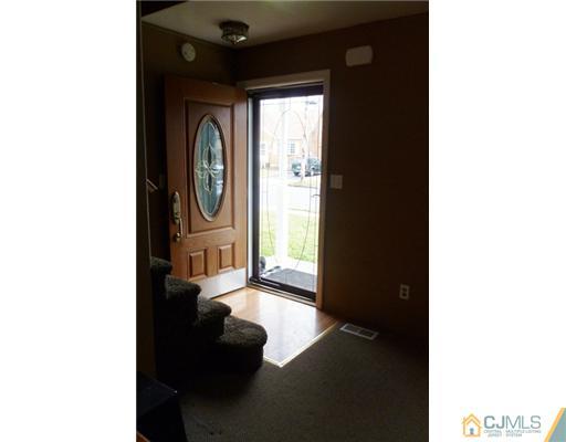 161 East Hill Road Colonia, NJ 07067 - Photo 2 of 16 a picture of a living room with a large window